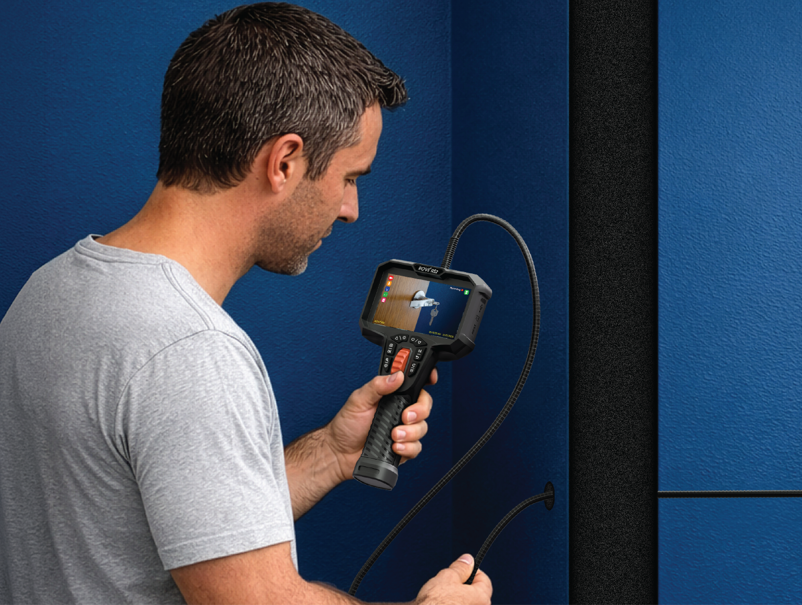 Technician using RS2 with extended 1.6 m gooseneck against a wall